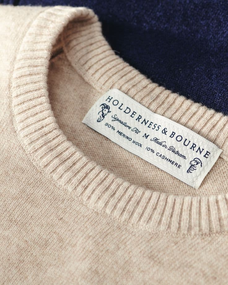 Woven label on a merino cashmere sweater